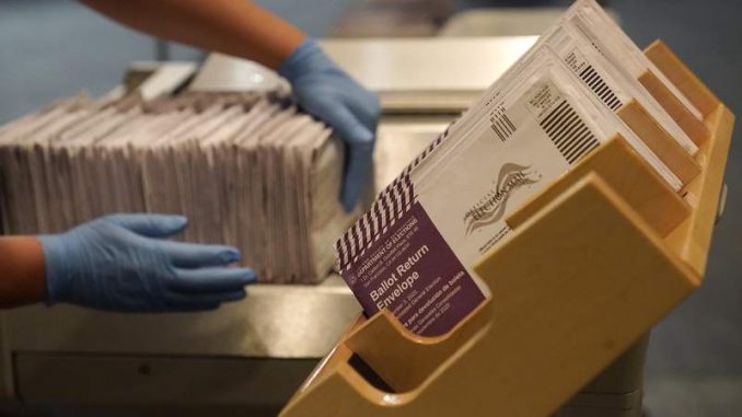 PRES-TRUMP-6M-Envelopes-containing-ballots-are-shown-at-a-San-Francisco-Department-of-Elections-at-a-voting-center-in-San-Francisco-Sunday-Nov.-1-2020.-AP-PhotoJeff-Chiu.jpg