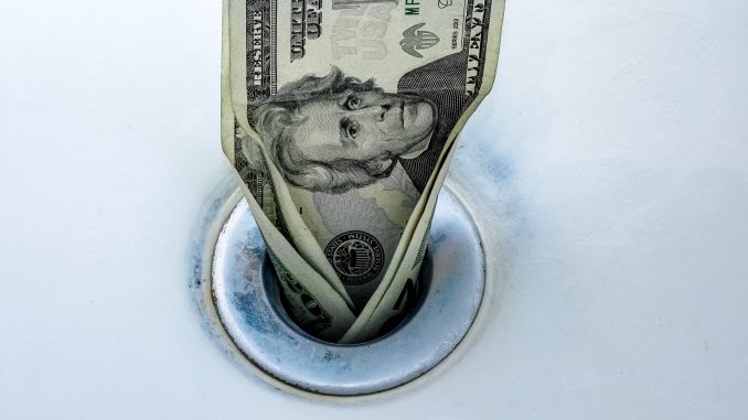 20231218_DollarsDownDrain-scaled.jpg