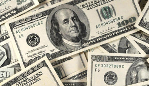 Stack-of-money-fiscal-cliff.jpg