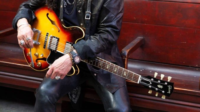 Slash-with-Gibson-ES-335-photo-credit_-Gene-Kirkland-scaled.jpg